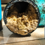 clogged drain solutions, prevent home drain clogs, common causes of drain blockages, how to unclog household drains, home plumbing maintenance tips, DIY drain cleaning methods, professional drain cleaning services, prevent grease drain clogs, bathroom drain clog prevention, kitchen sink blockage solutions